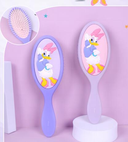 Lược massage đệm khí Daisy