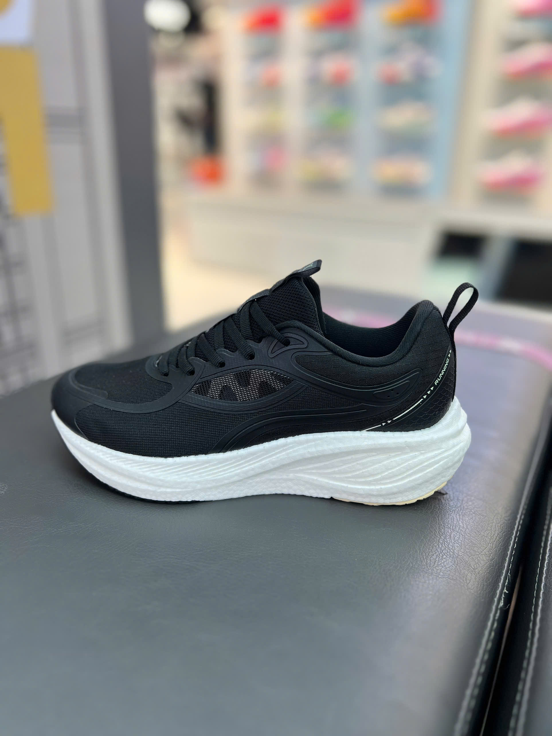 xtep giay chay nu 977318110018