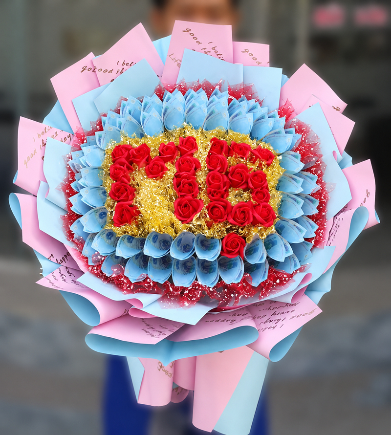 Bó hoa tiền phối sắc đỏ, xanh và hồng được sắp xếp theo hình trái tim nổi bật. (Nguồn: Internet)
