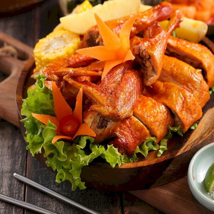 Gà nướng lu mang đậm hương vị truyền thống của ẩm thực Việt (Nguồn: Internet) Gà nướng lu mang đậm hương vị truyền thống của ẩm thực Việt (Nguồn: Internet)