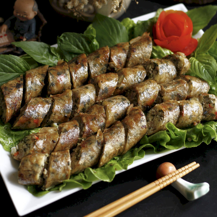 Lòng dồi nướng mang đậm phong vị ẩm thực Việt (Nguồn: Internet) Lòng dồi nướng mang đậm phong vị ẩm thực Việt (Nguồn: Internet)