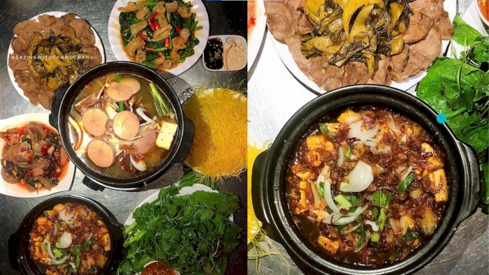 Bàn ăn Lẩu Bò Bà Nghệ ở Hà Nội với lẩu riêu cua bắp bò và các món ăn kèm hấp dẫn.