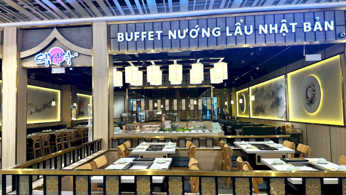 Nhà hàng buffet nướng lẩu Nhật Bản Shabu Ya tại Hà Nội với không gian ấm cúng và nhiều bàn ăn.
