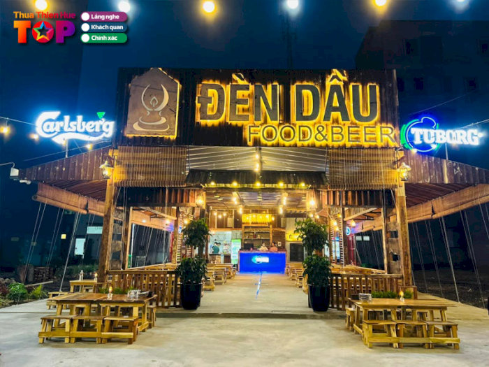 Qu&aacute;n Đ&egrave;n Dầu Food & Beer Đ&agrave; Nẵng Mặt tiền qu&aacute;n Đ&egrave;n Dầu Food & Beer nổi bật với &aacute;nh s&aacute;ng v&agrave;ng ấm &aacute;p tại Đ&agrave; Nẵng.