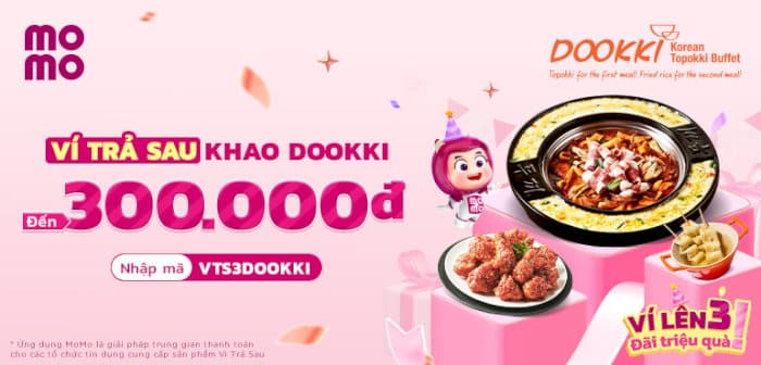Biển hiệu Dookki Đồng Khởi với chương trình khuyến mãi MoMo hấp dẫn, thiết kế hiện đại và màu sắc tươi sáng.