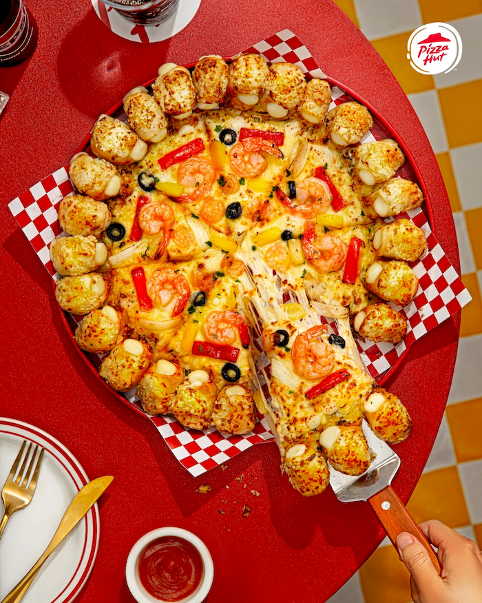 Pizza hải sản l&agrave; một trong những m&oacute;n được y&ecirc;u th&iacute;ch nhất tại Pizza Hut